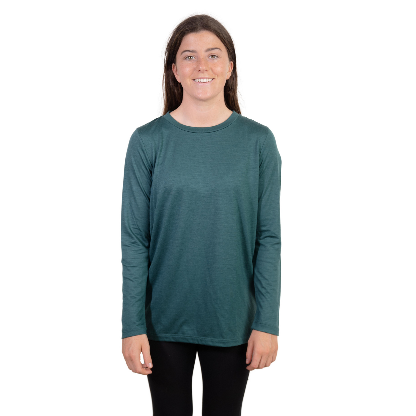 Front shot of Ottie Merino women's Otway Fern long sleeve merino wool t-shirt on 166cm model who is wearing a size small