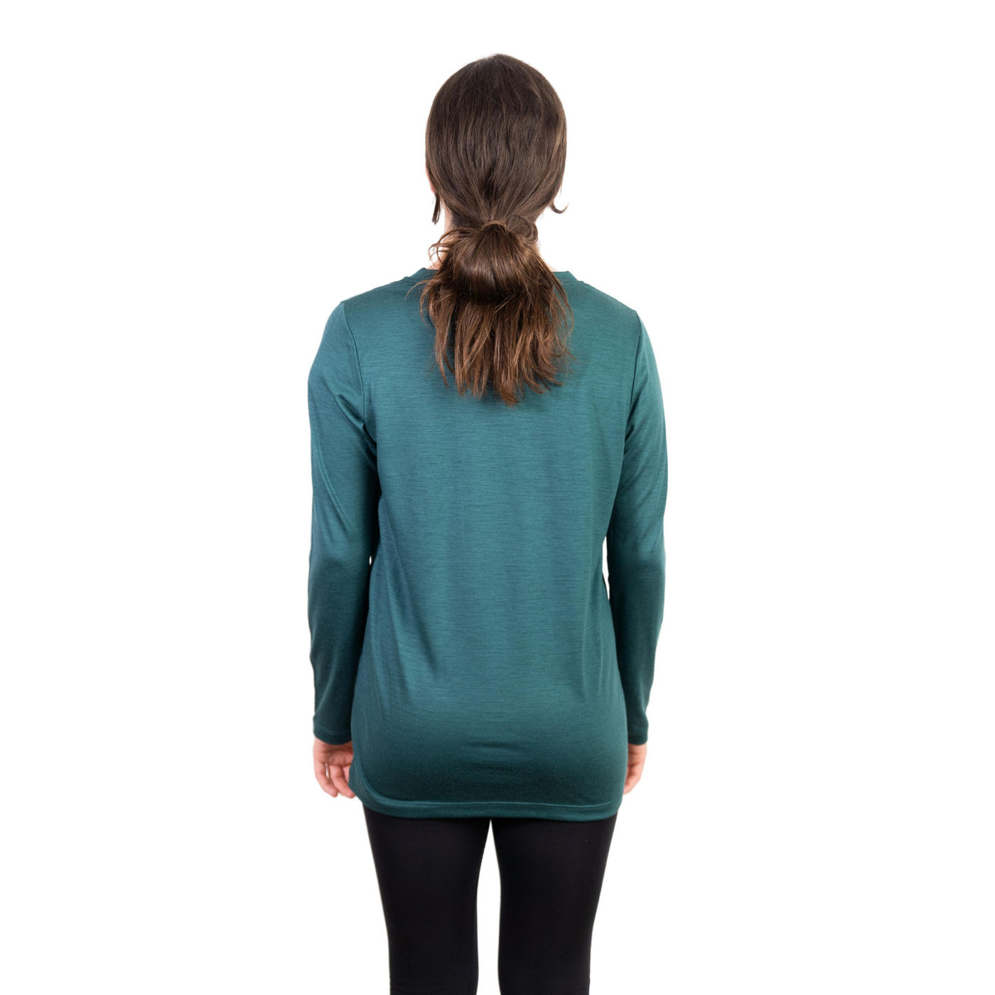 Back shot of Ottie Merino women's Otway Fern long sleeve merino wool t-shirt on 166cm model who is wearing a size small