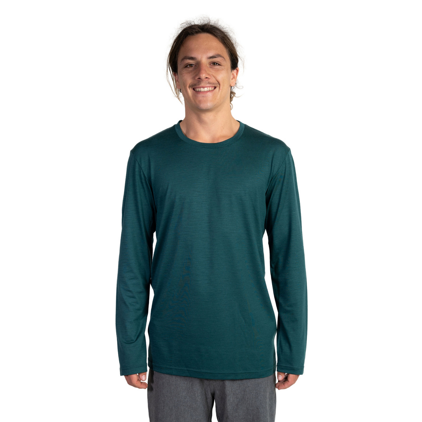 Front shot of Ottie Merino men's Otway Fern long sleeve merino wool t-shirt on 173cm model who is wearing a size medium