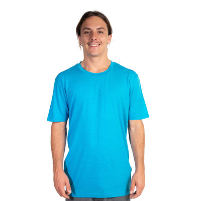 Front shot of Ottie Merino men's Coastal Blue short sleeve merino wool t-shirt on 173cm model who is wearing a size medium