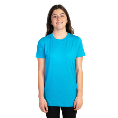 Front shot of Ottie Merino women's Coastal Blue short sleeve merino wool t-shirt on 166cm model who is wearing a size small